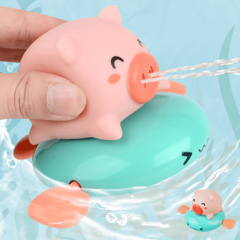 Заводная игрушка для купания «Плавающая свинка» фото 1