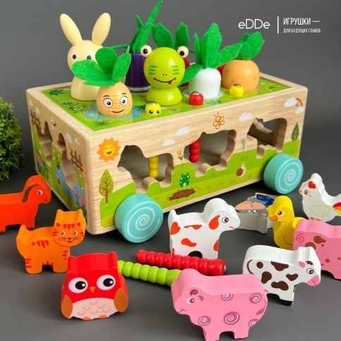 Многофункциональная деревянная развивающая игрушка 6 в 1 «Кролик и Лягушонок на грядке» фото 1