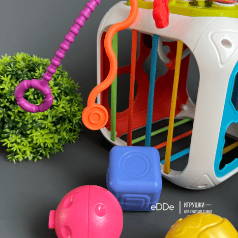 Многофункциональная развивающая игрушка для малышей «Сенсорный куб 7 в 1» фото 4