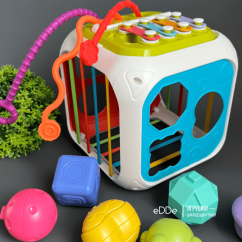 Многофункциональная развивающая игрушка для малышей «Сенсорный куб 7 в 1» фото 6