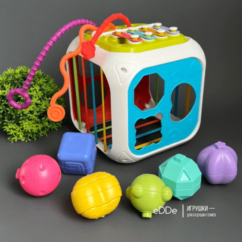 Многофункциональная развивающая игрушка для малышей «Сенсорный куб 7 в 1» фото 2