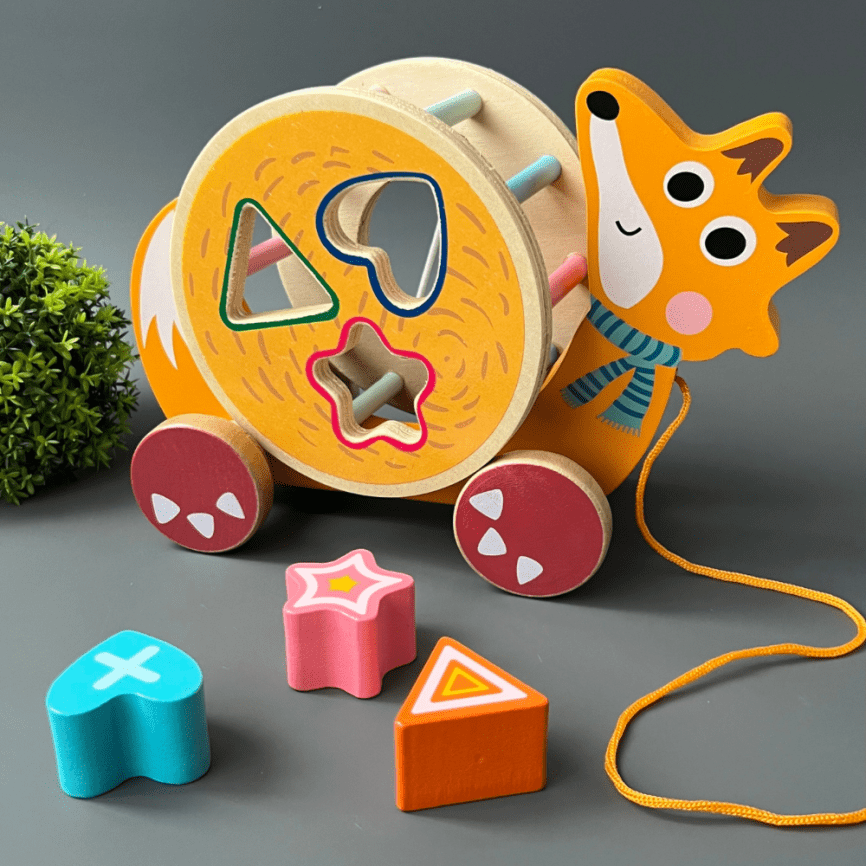 Развивающая игрушка каталка-сортер 2 в 1 "Лисичка" фото 1